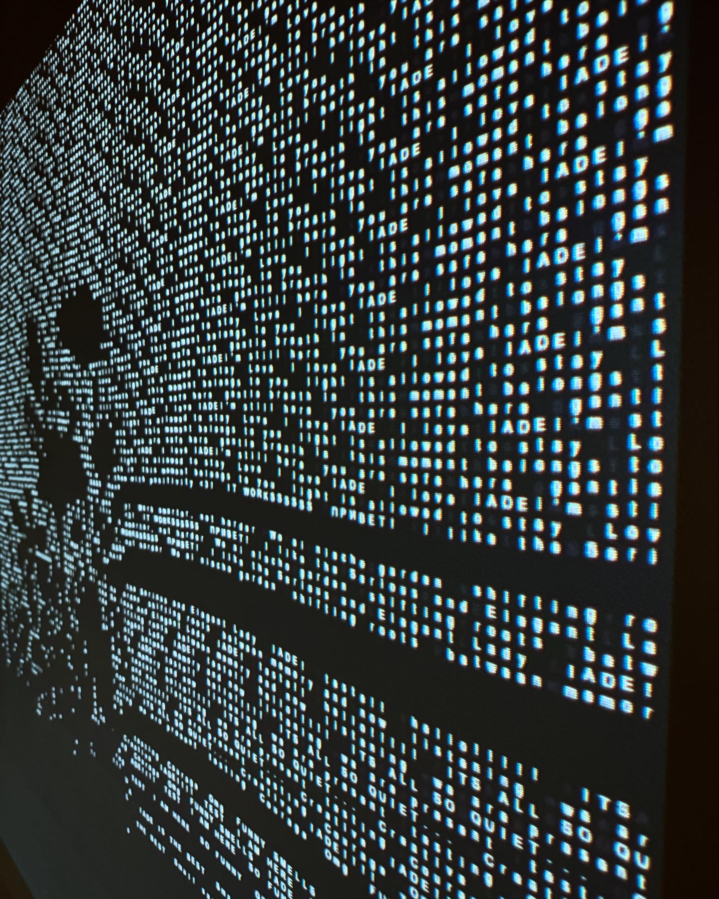 Close detail of the shifting text-character grid