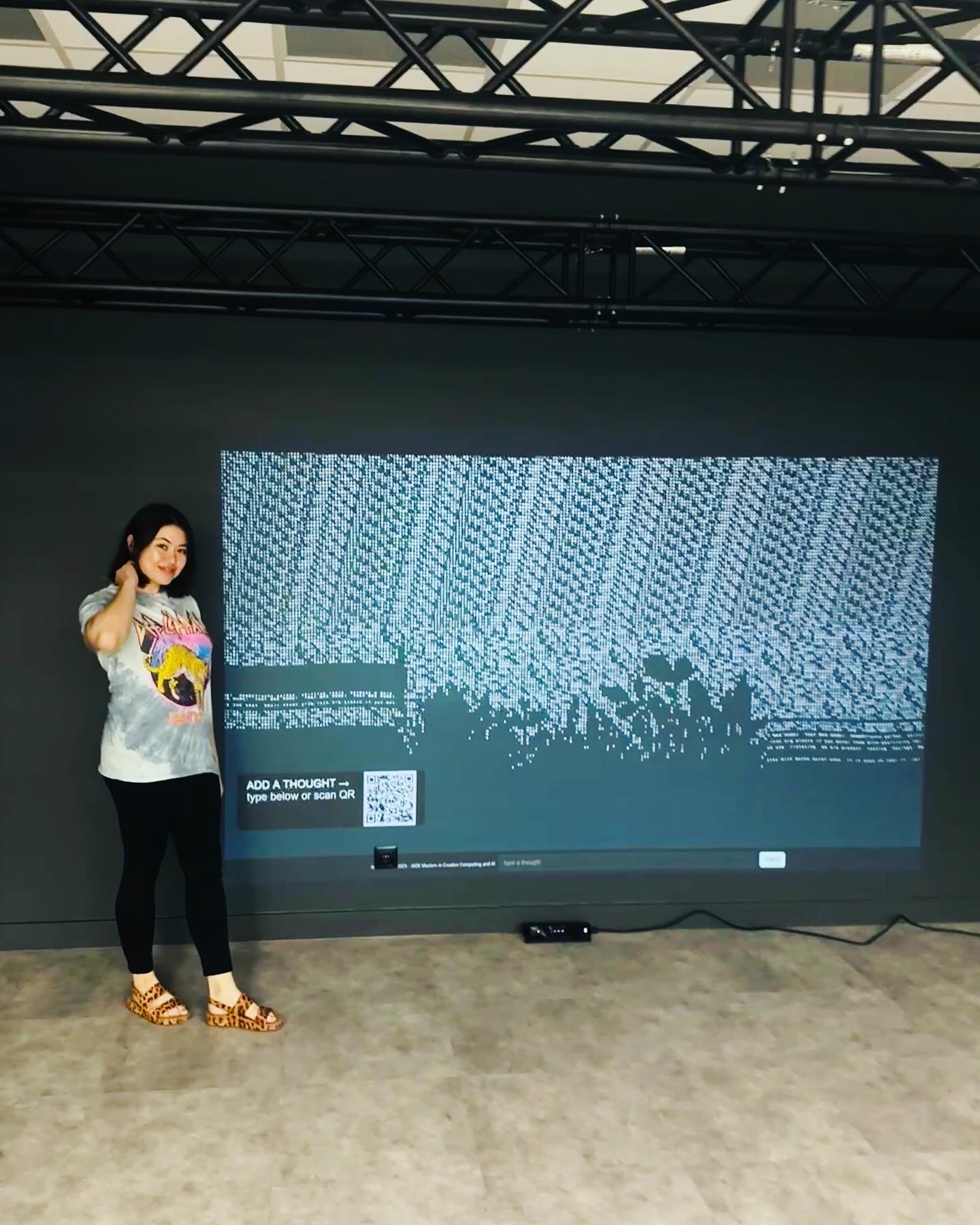 Nadine standing beside the installation