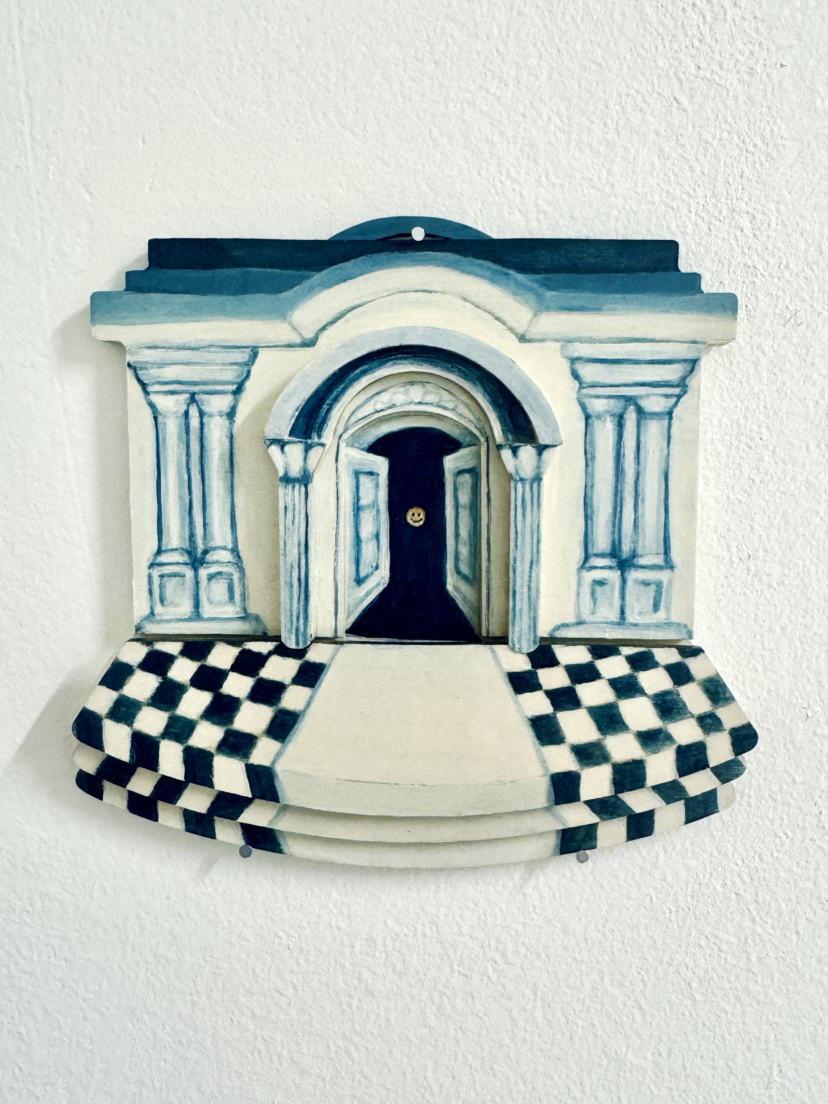 Painting of a blue arched doorway with a checkered floor and a smiling doorknob