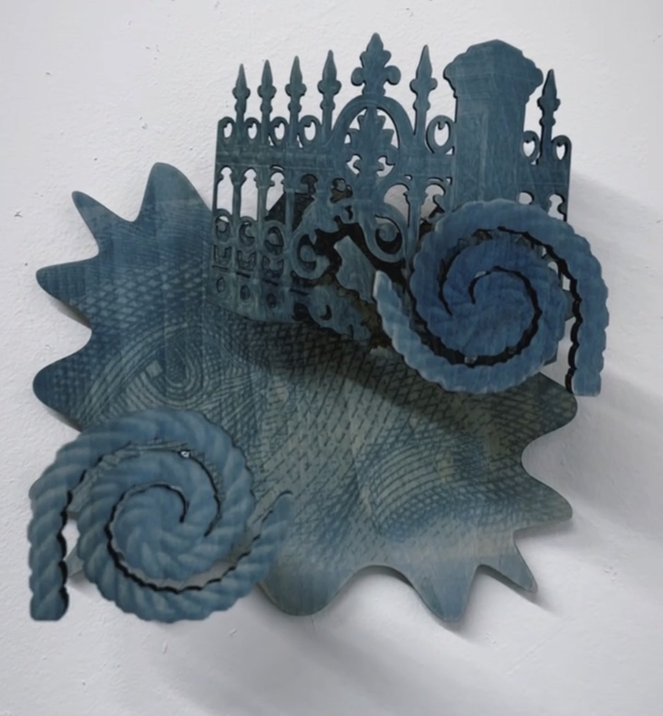 Indigo-dyed laser-cut relief, gate and scroll forms