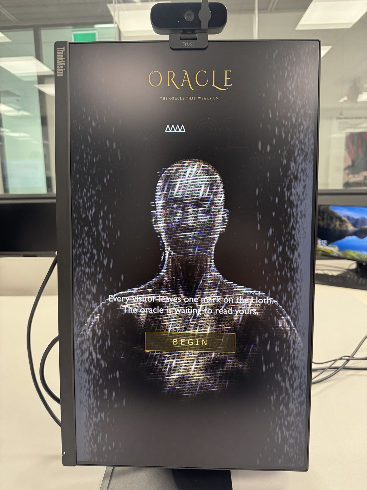 The oracle screen waiting, with a BEGIN button