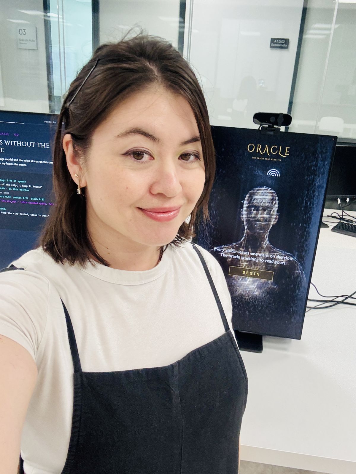 Nadine Allan next to the oracle screen